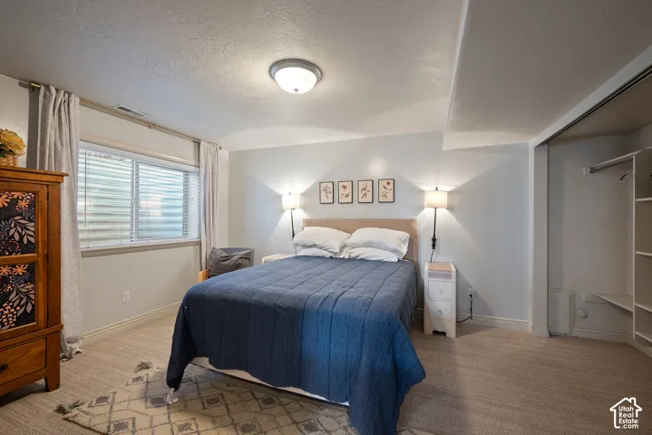 Private basement bedroom within the lower-level living quarters. The one-bedroom apartment has historically rented for approximately $1,700