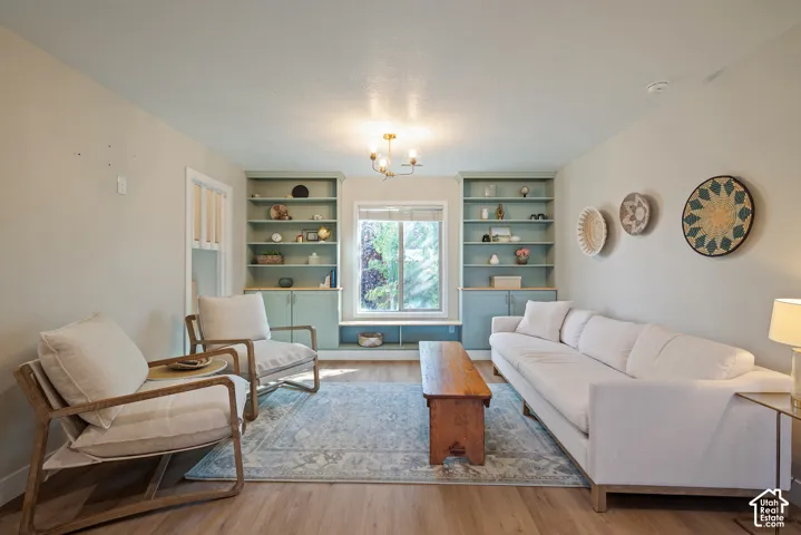 A welcoming second-floor loft at the center of the home, extending the open, connected feel with built-in storage or display space and a comfortable bench seat.