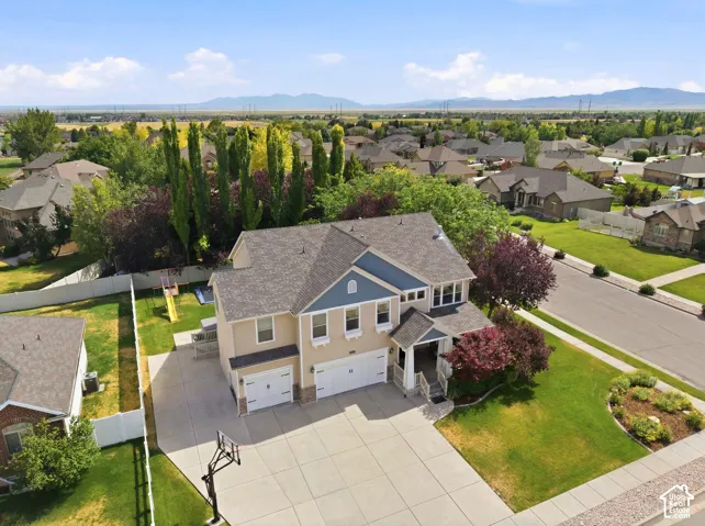 Two-story residence with a covered entry
