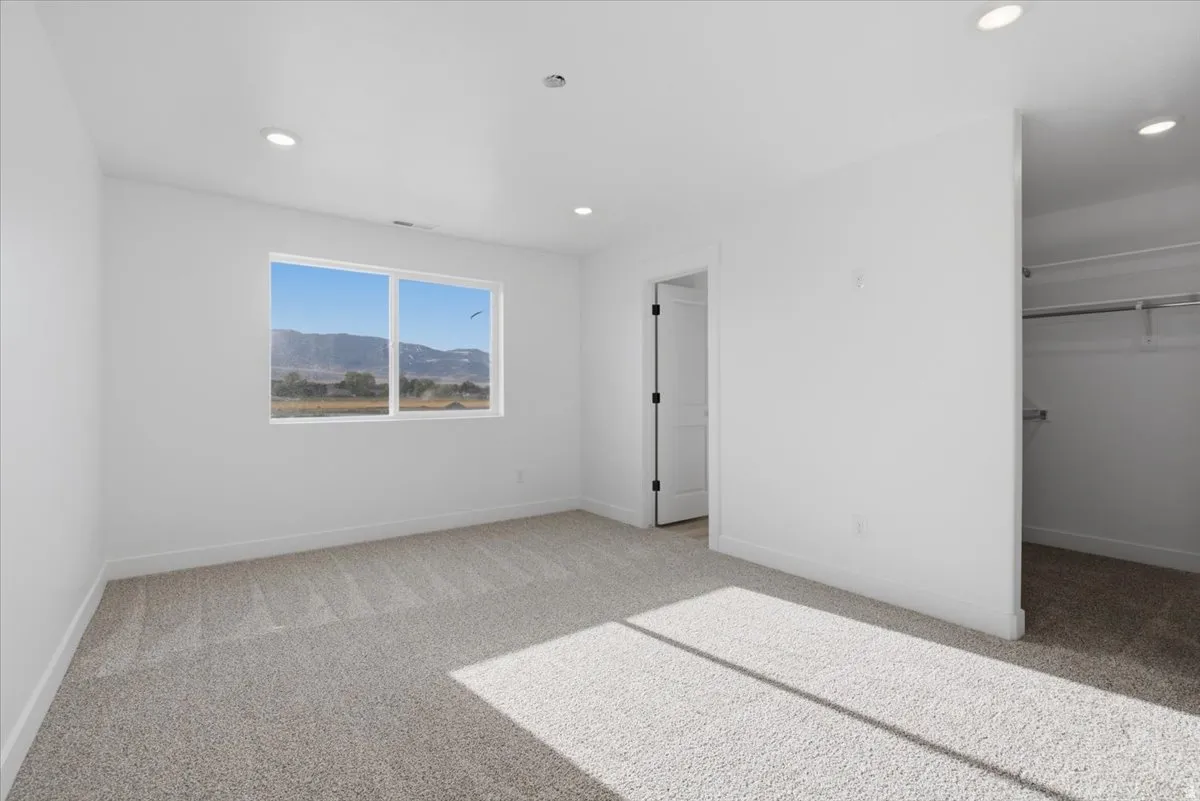 Primary Suite with walk-in closet.