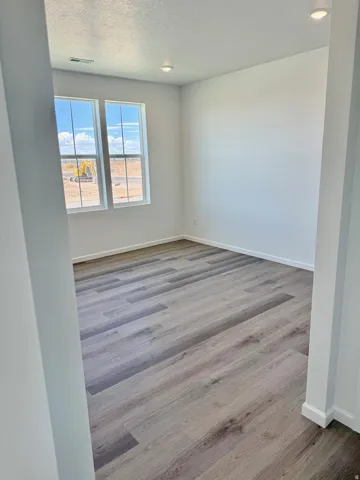 Large office off the front entry with 9' ceilings.