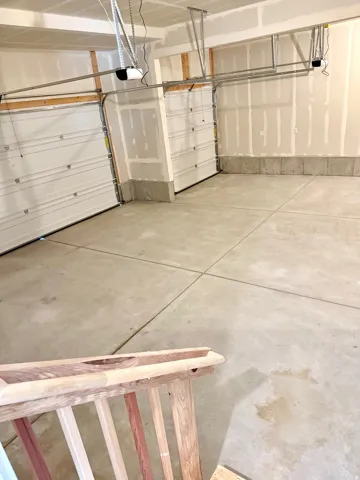 3 car garage with additional shop space.