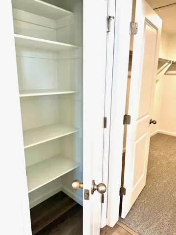 Linen closet in the Primary bathroom.