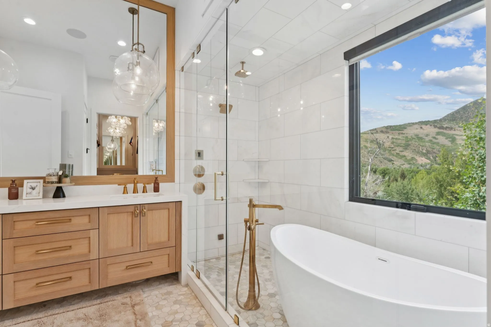 Contemporary bathroom featuring a freestanding soaking tub, a large picture window, and a glass-enclosed shower with multiple shower heads
