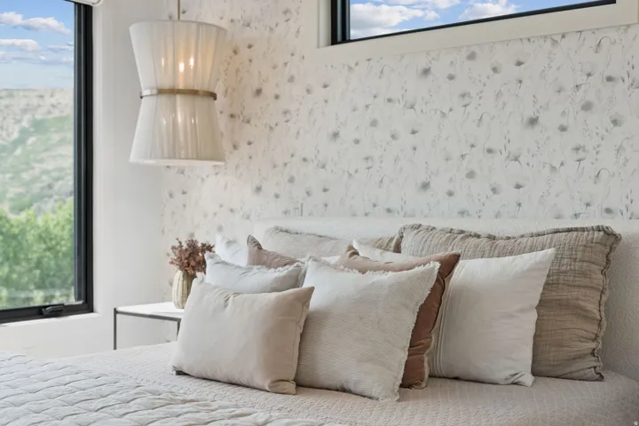 Accent wall featuring floral-patterned wallpaper