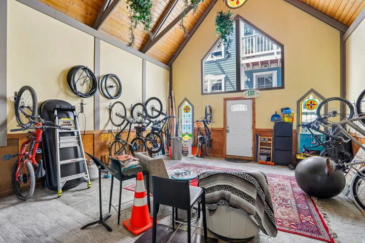 Vaulted wood-paneled ceiling with exposed beams