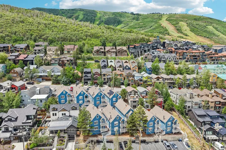 Expansive residential area featuring diverse architectural styles with pitched roofs and multiple stories