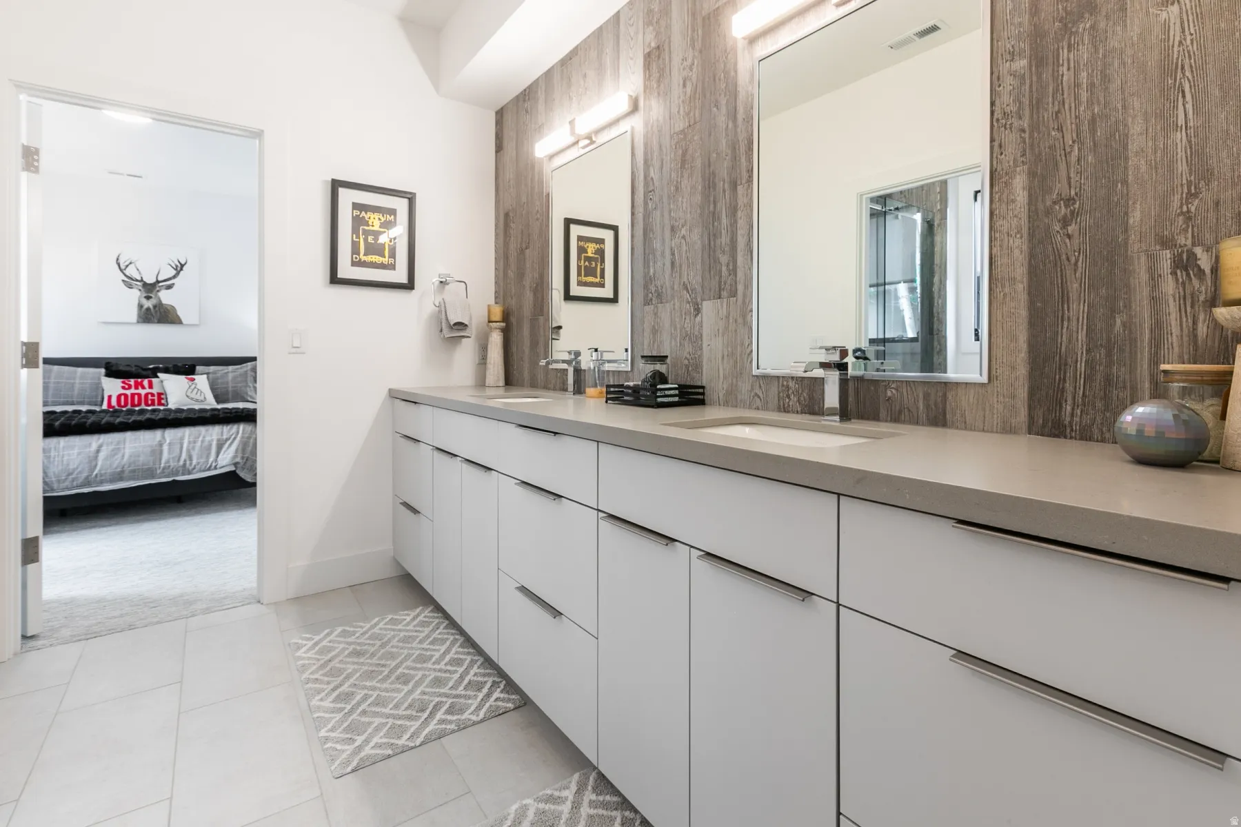 Double vanity with integrated sinks and stone-finish countertop