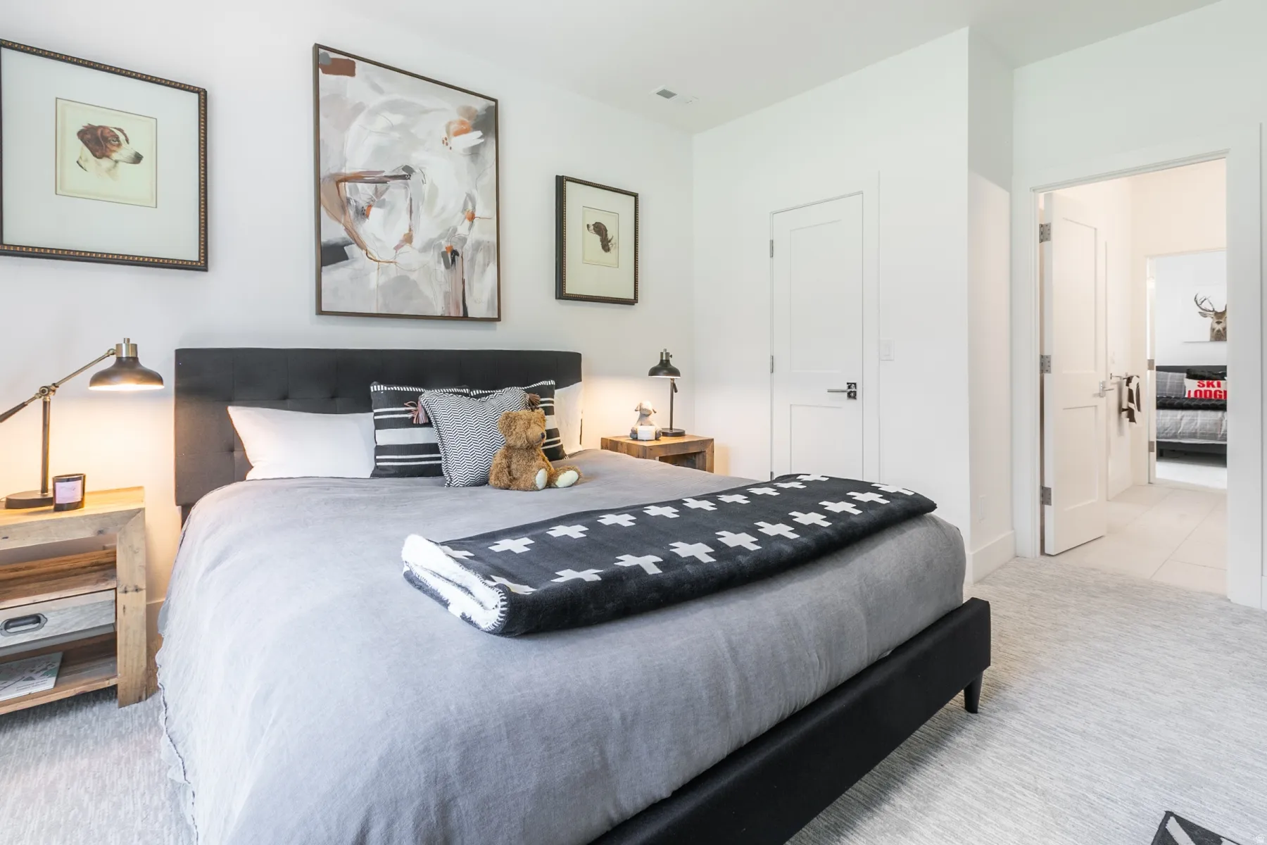 Bedroom featuring light-colored wall paint and coordinating carpeting