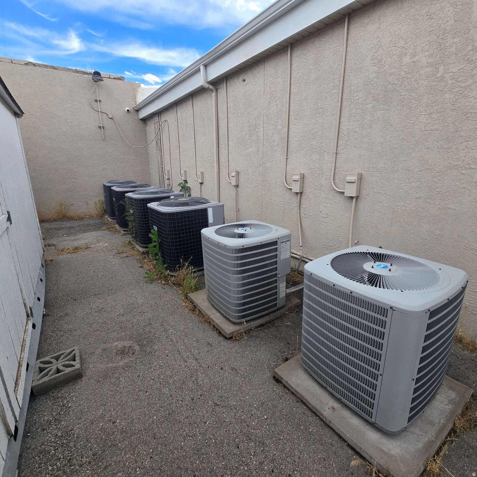 5 AC units with more on the roof.
