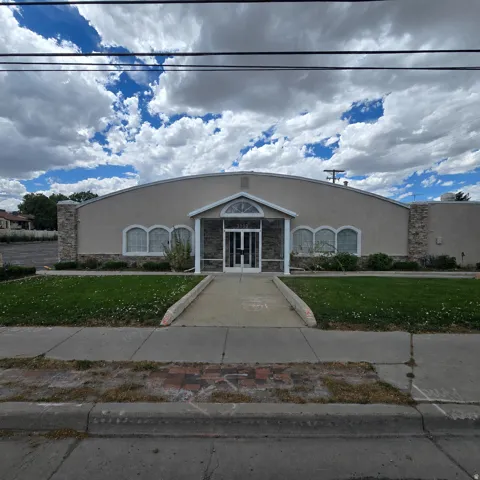 10,950 square foot commerical building - C-2 zoning with Redwood Road frontage.
