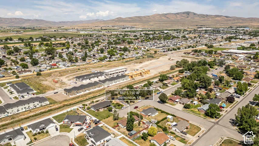 Aerial perspective showcasing a residential area with varied housing styles