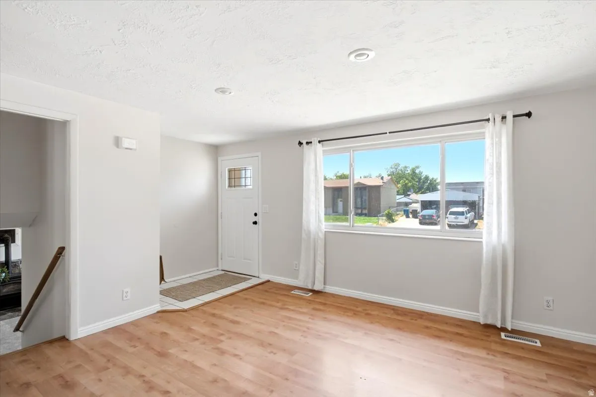Front entry. large front window