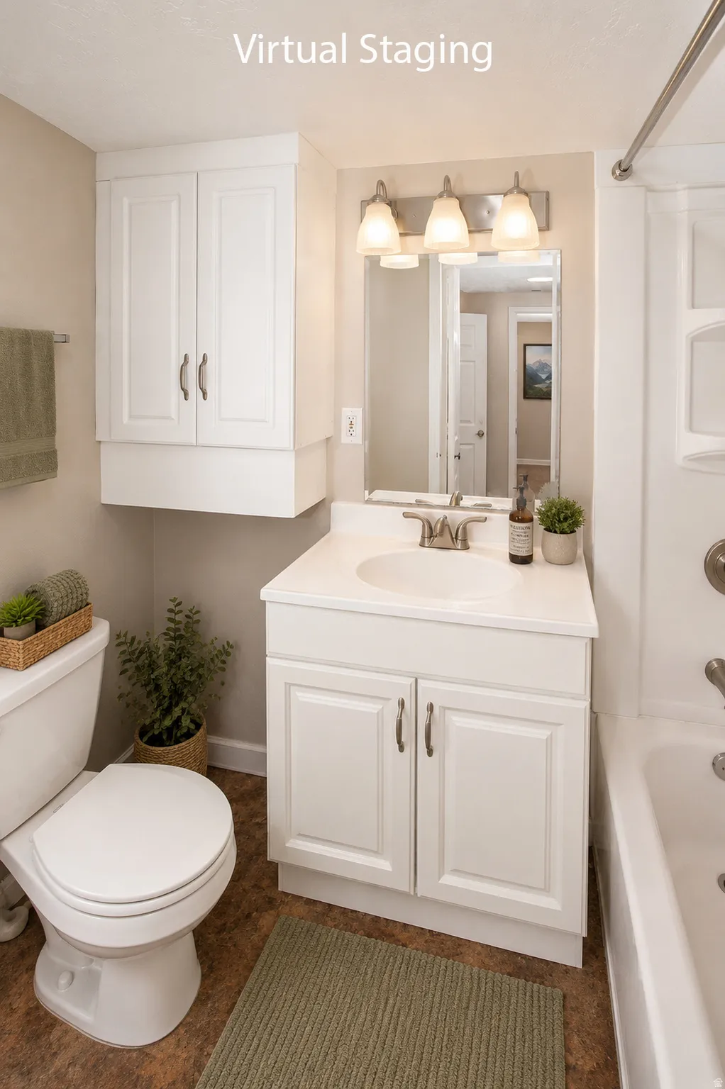 Bathroom featuring a white vanity with integrated sink, white cabinetry with brushed nickel hardware, and wood-finish flooring