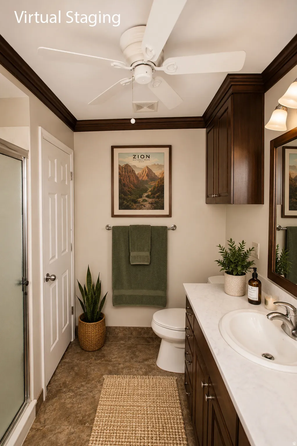 Bathroom featuring a single vanity with a white countertop, dark wood-finish cabinetry, and a ceiling fan