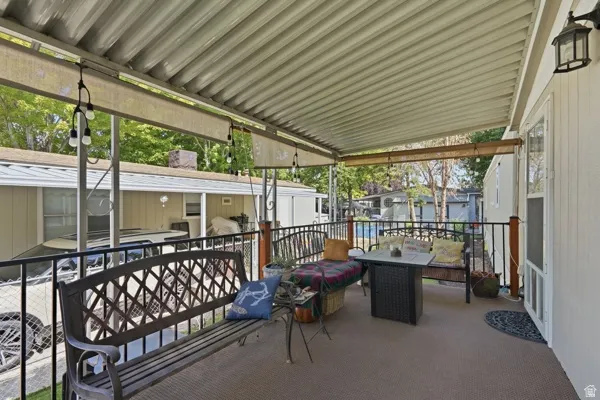 Covered outdoor patio featuring a corrugated metal roof