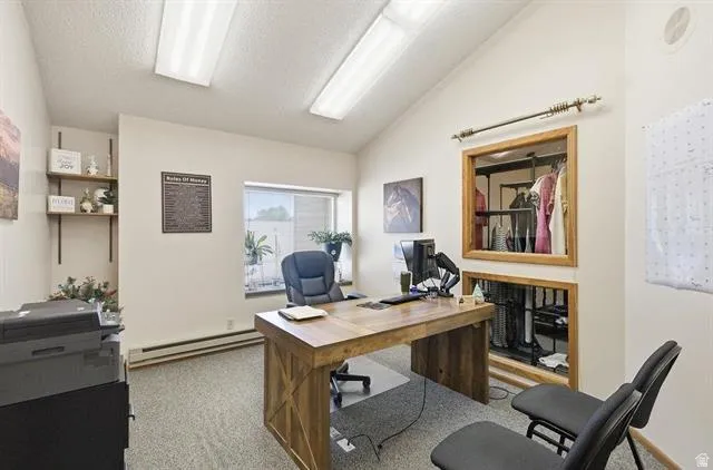 Sloped ceiling room featuring a large window, integrated shelving, and a built-in closet with wood-finish trim