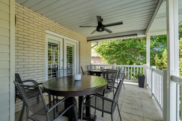 Outdoor living space right outside the kitchen with stunning view of the Lake