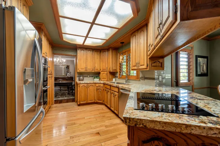 Real Hardwood flooring an brand new cooktop.