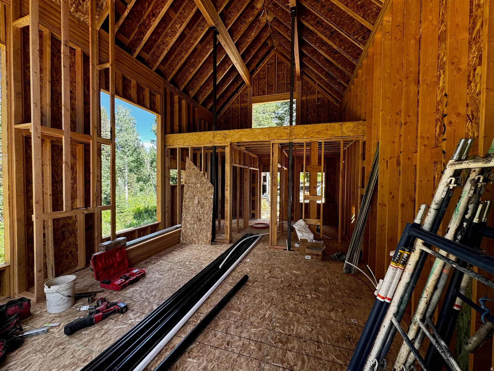 Quality craftsmanship underway - showcasing the impressive vaulted framing and signature A-frame structure.