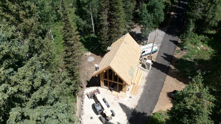 Private mountain seeing surrounded by mature trees just minutes from year-round outdoor recreation.