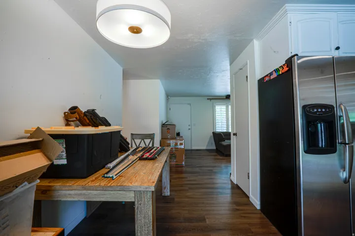 Wood-finish flooring extending throughout the space