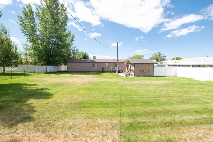 Expansive green lawn providing ample outdoor space