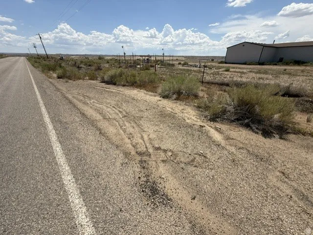 Paved road frontage with direct property access