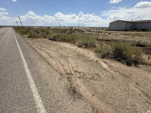 Paved road frontage with direct property access