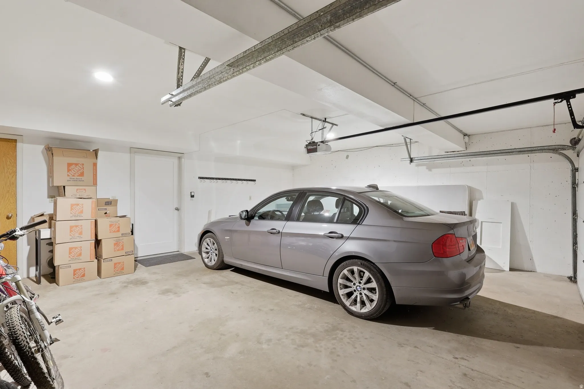 Spacious, oversized garage with ample room for 2 vehicles plus bikes, toys and storage.