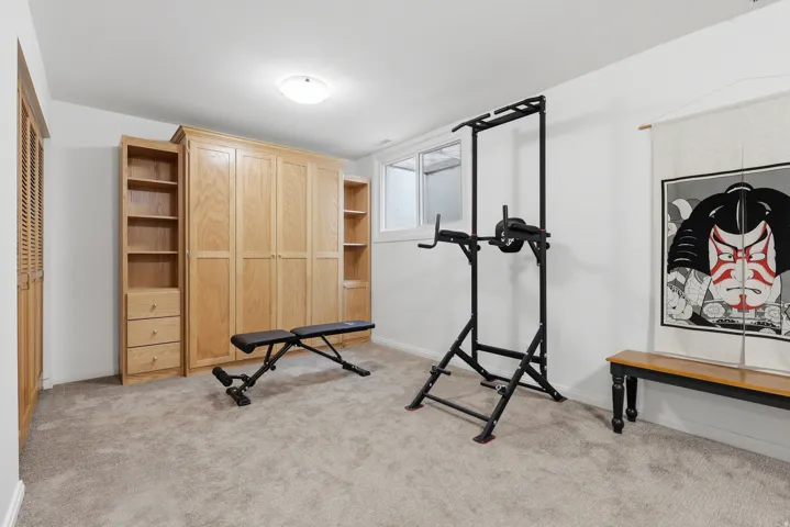 Bedroom #4 is open to the famliy room has a pull-down Murphy bed that is open to the family room.