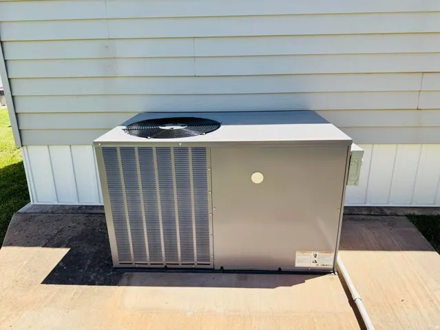 Exterior air conditioning unit on a concrete pad