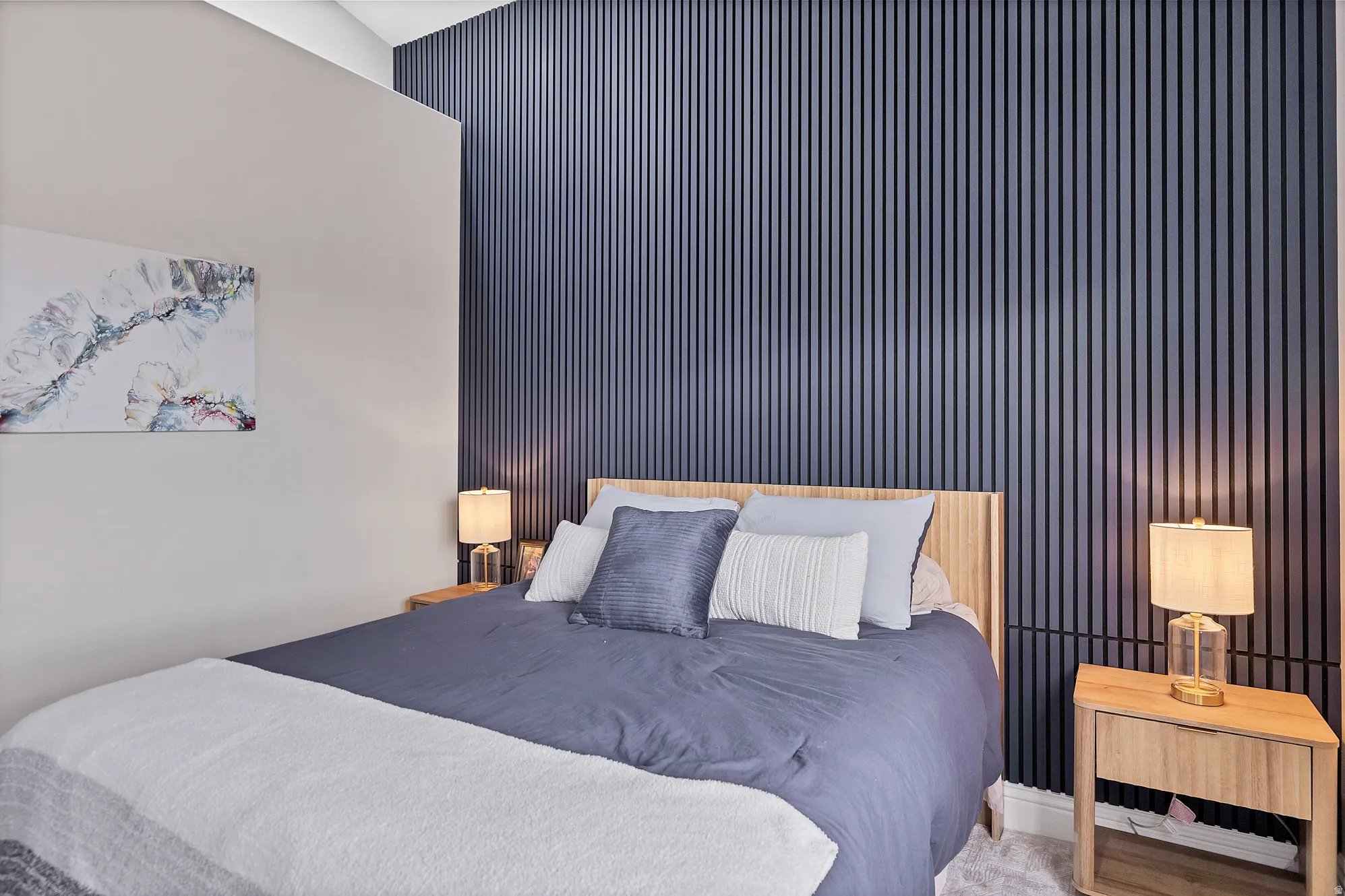 Accent wall featuring vertical paneling