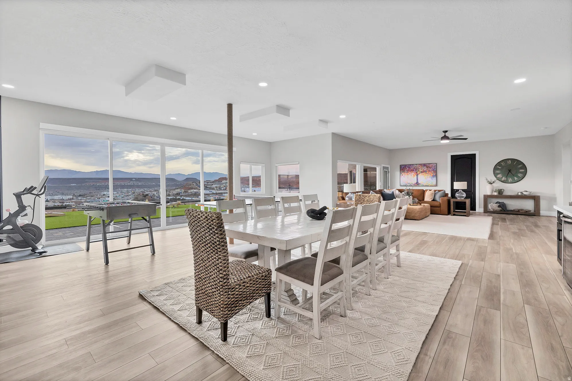 Open-concept interior featuring wood-finish flooring and recessed lighting