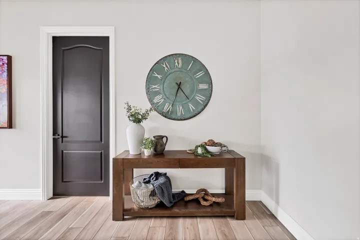 Neutral wall paint complementing light wood-finish flooring