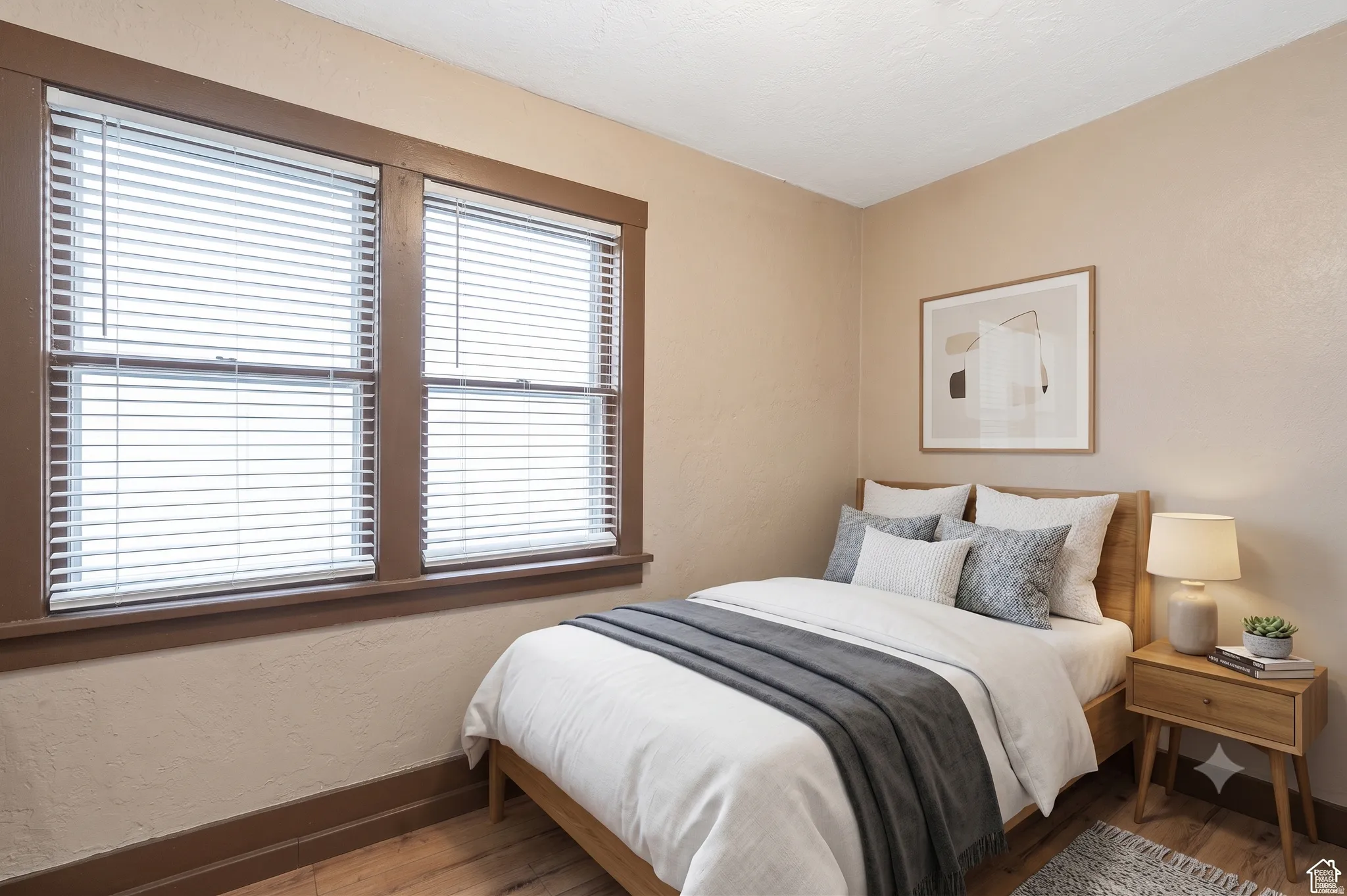 Warm-toned interior with hardwood flooring and textured walls