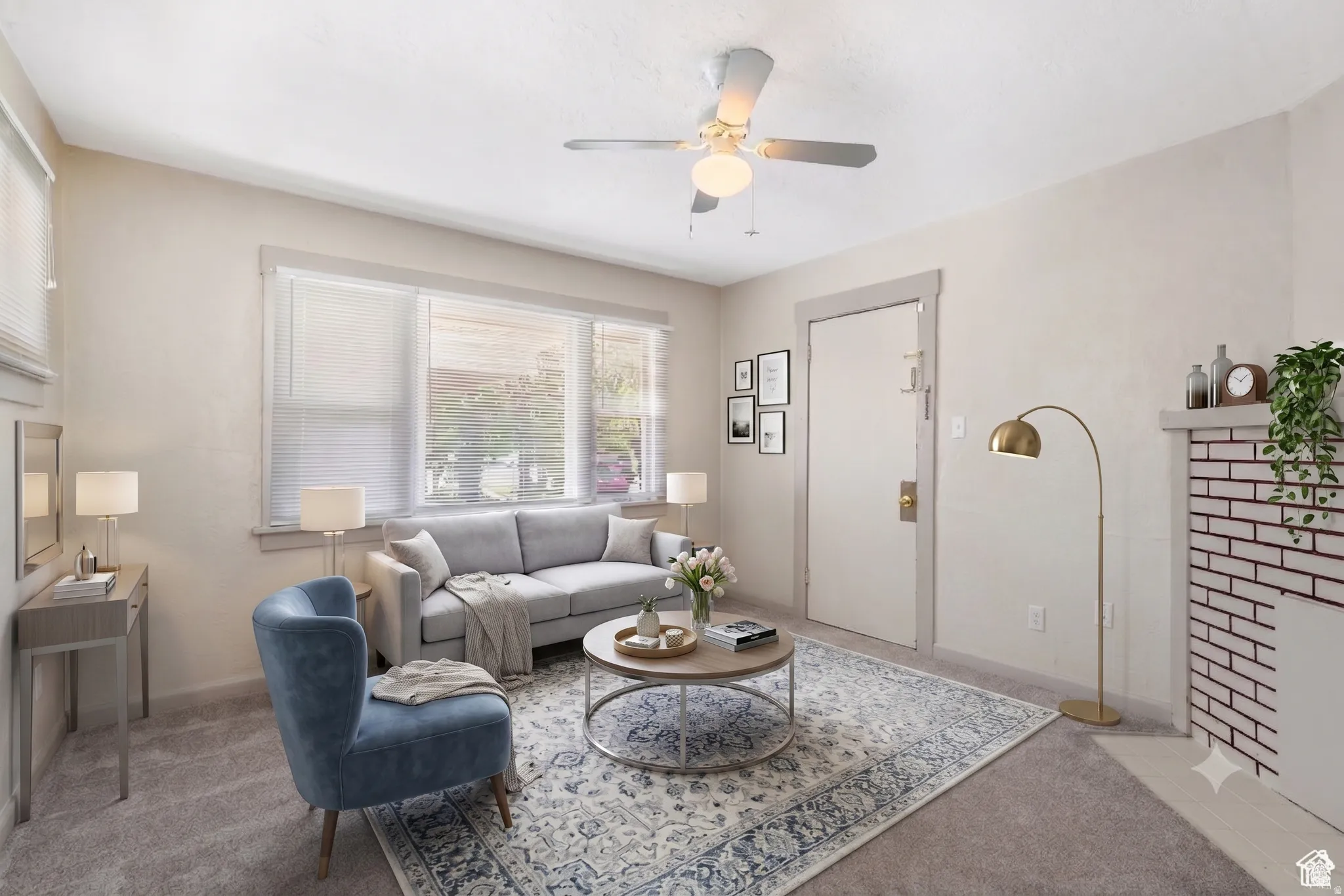 Living room featuring light-colored wall paint and carpet flooring
