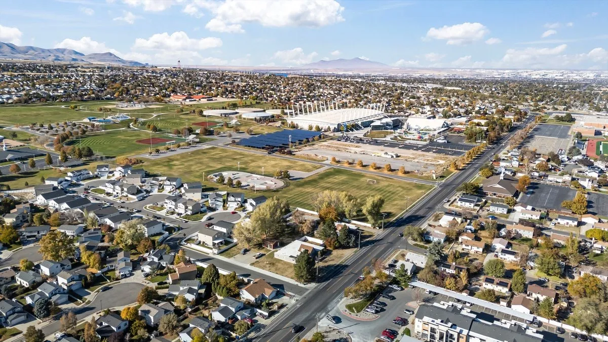 Aerial perspective showcasing a residential neighborhood with varied housing styles