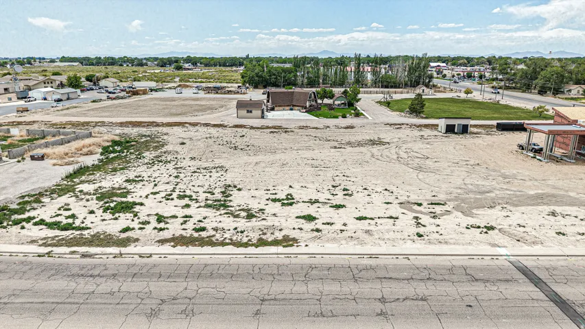 Expansive undeveloped lot featuring a level grade and direct road frontage