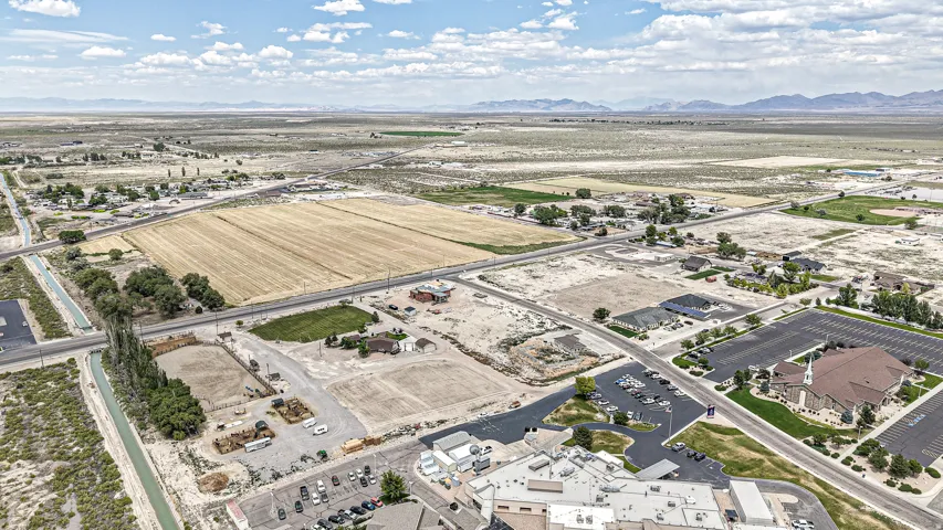 Expansive aerial landscape featuring various developed and undeveloped parcels