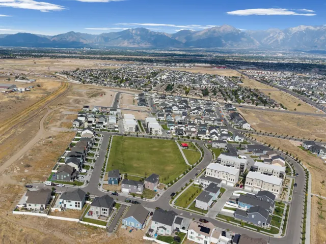 Aerial perspective showcasing a developing residential area with diverse housing styles