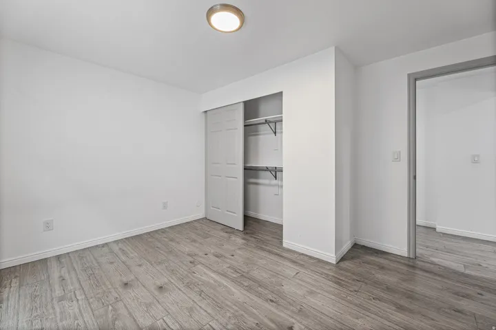 Comfortable secondary bedroom with a generous closet and an open layout, offering flexible space for guests, a home office, or hobbies.