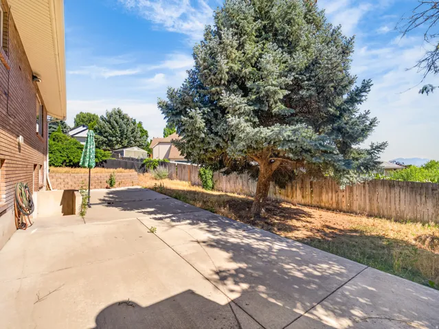 Expansive concrete patio area offering significant outdoor space