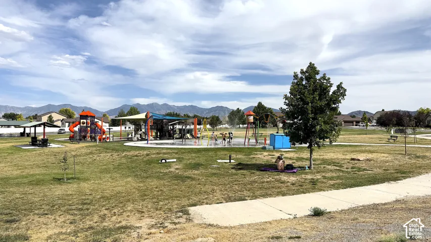 Grantsville Hollywood Park featuring a  SPLASH-PAD, multiple playgrounds, picnic tables and covered picnic areas.
