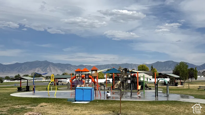 Grantsville Hollywood Park featuring a  SPLASH-PAD, multiple playgrounds, picnic tables and covered picnic areas.