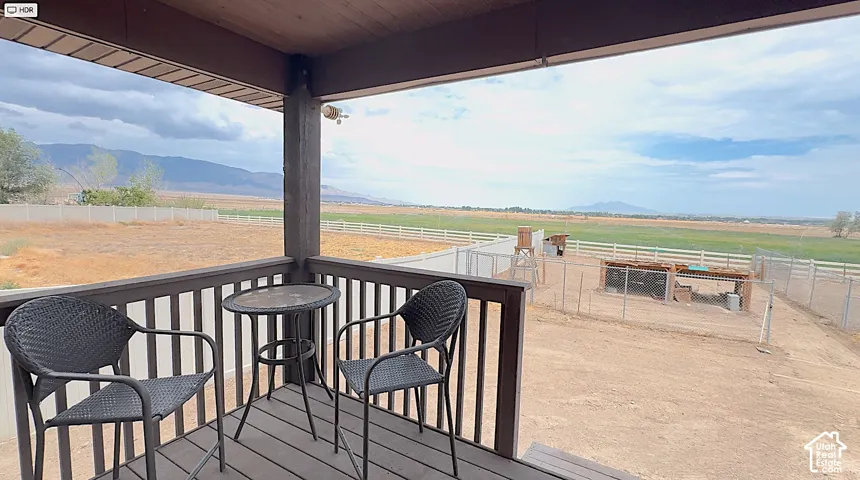Covered balcony with TREX flooring and railing with a beautiful view of the valley.