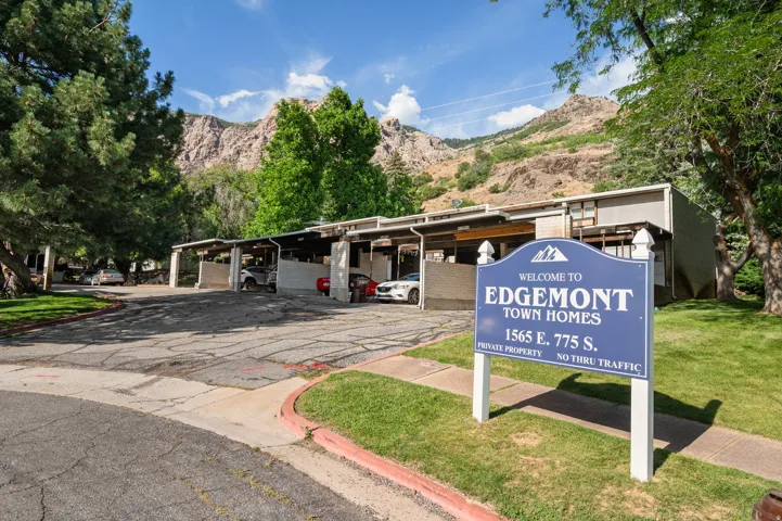 The Edgemont Town Homes sign introduces the property, featuring a multi-unit structure with covered parking spaces