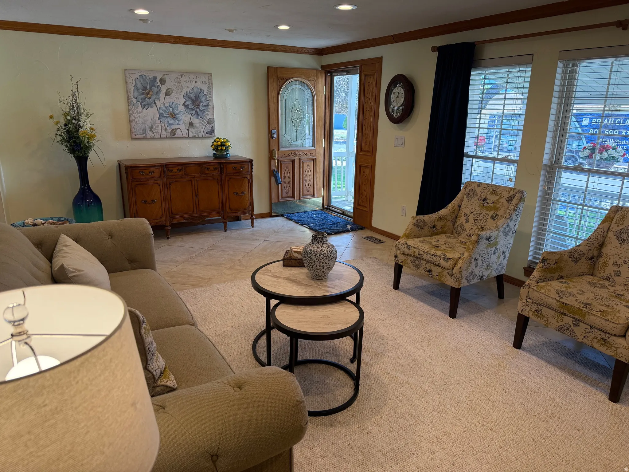 Entryway featuring a wood-panel door with leaded glass, recessed lighting, great natural lighting and tile flooring