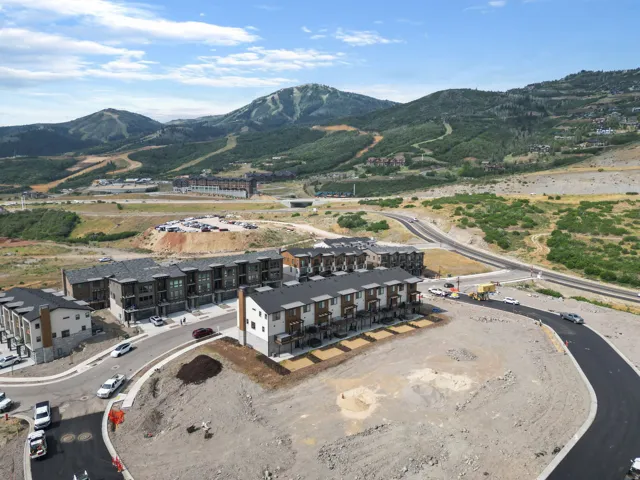 Contemporary townhome community with mountain backdrop