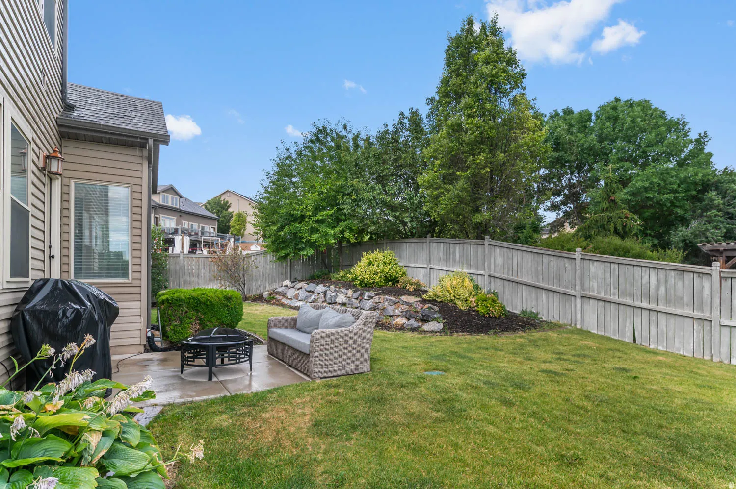 Rear patio with concrete surface